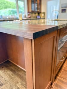 Kitchen Island Exterior with Cherry Panels and Walnut Butcher Block